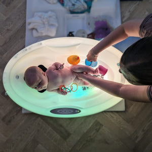 Baby enjoying a whirlpool bath
