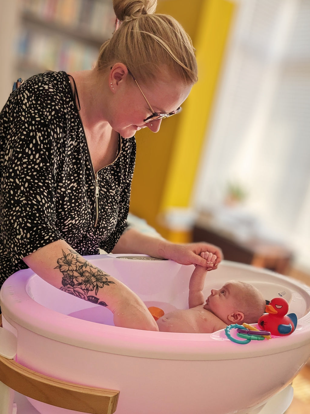 Mum and baby enjoying a spa bath